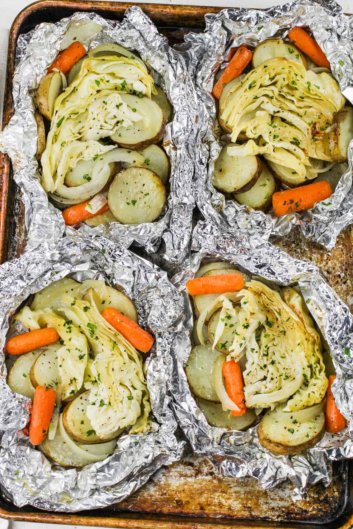 Boiled potatoes, cabbage, and vegetables