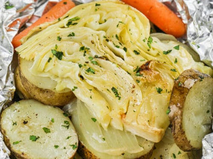 Boiled potatoes, cabbage, and vegetables